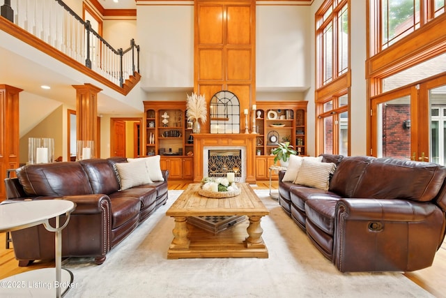 1014 Anchorage Woods Cir, Anchorage, KY 40223 - living room featuring a high ceiling and a fireplace