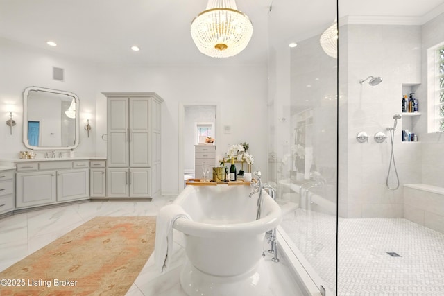 1014 Anchorage Woods Cir, Anchorage, KY 40223 - full bathroom featuring walk in shower, a freestanding bath, vanity, a chandelier, and recessed lighting