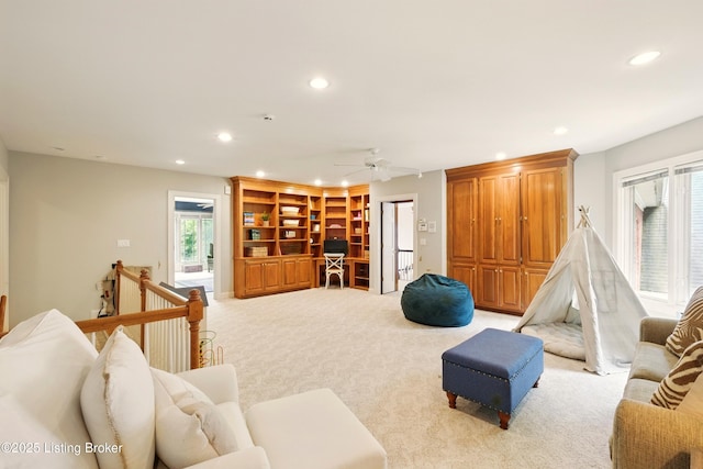 1014 Anchorage Woods Cir, Anchorage, KY 40223 - living room with recessed lighting, light colored carpet, an office area, ceiling fan, and built in shelves