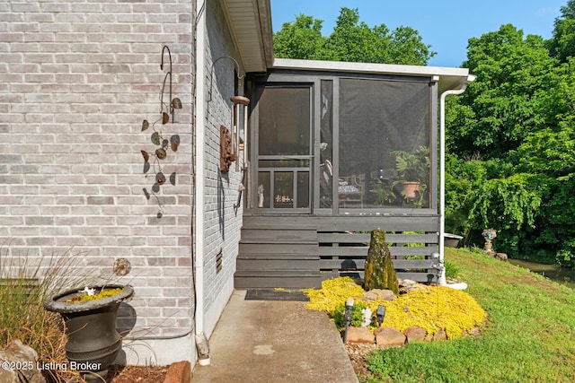 2327 Highgrove Rd, Coxs Creek, KY 40013 - view of side of property with a sunroom and brick siding
