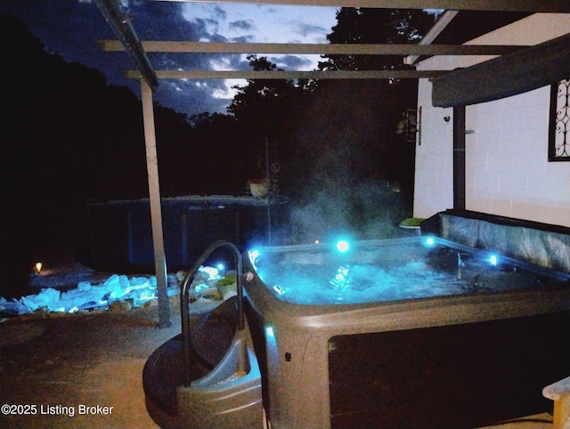 2327 Highgrove Rd, Coxs Creek, KY 40013 - patio at night featuring a jacuzzi