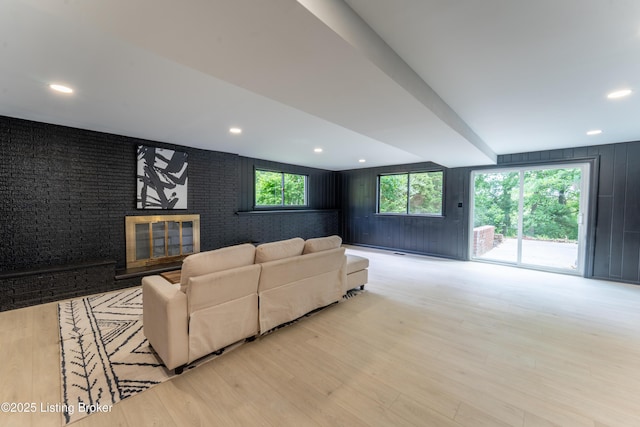 508 Wilderness Rd, Louisville, KY 40214 - living area featuring a fireplace, wood finished floors, and recessed lighting