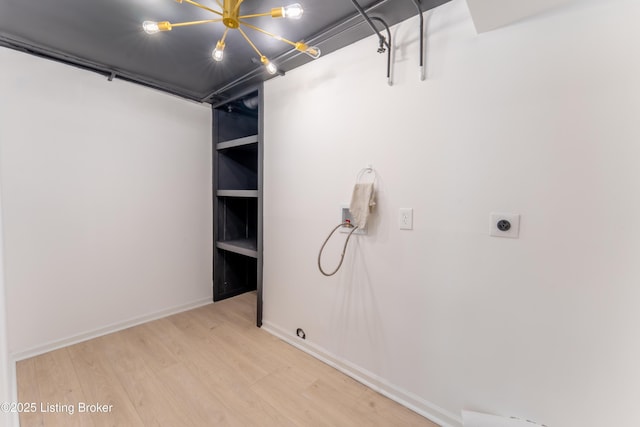 508 Wilderness Rd, Louisville, KY 40214 - laundry room with washer hookup, light wood-style floors, hookup for an electric dryer, and baseboards