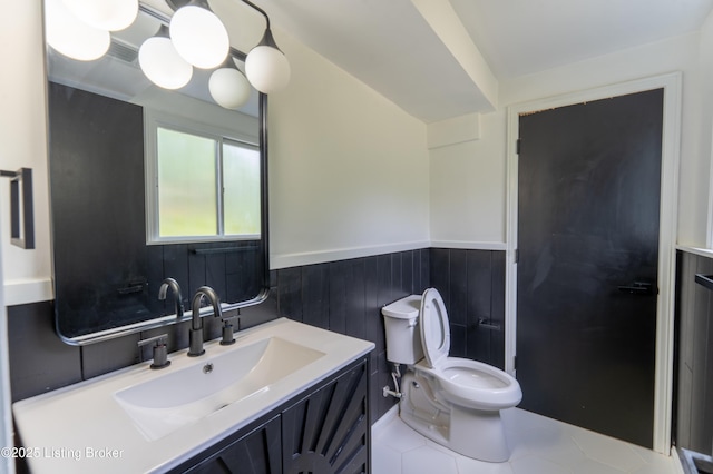 508 Wilderness Rd, Louisville, KY 40214 - bathroom featuring a wainscoted wall, vanity, and toilet