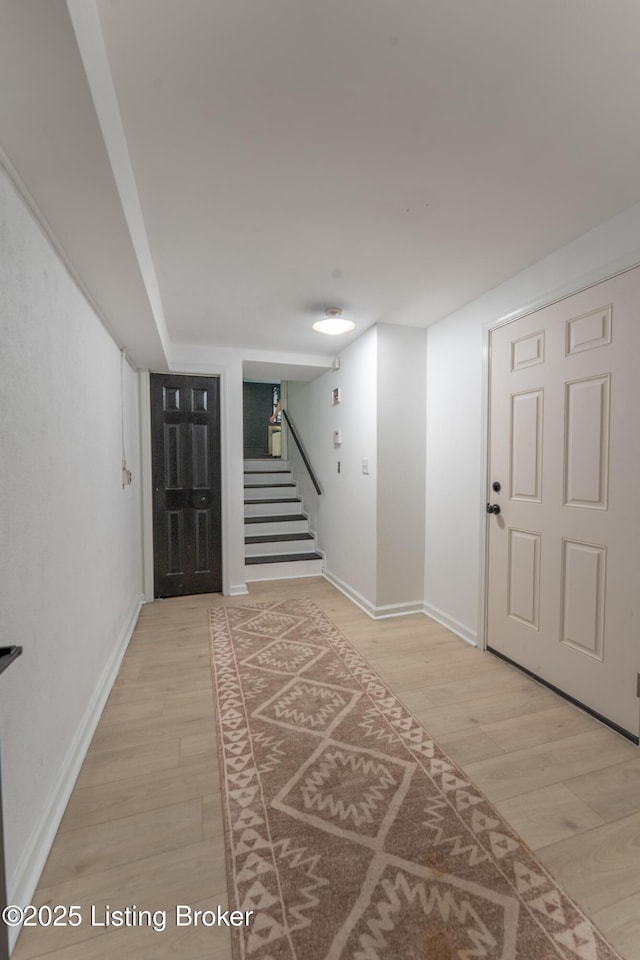508 Wilderness Rd, Louisville, KY 40214 - entrance foyer featuring light wood-style floors, stairs, and baseboards