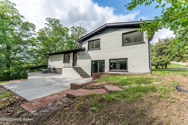 508 Wilderness Rd, Louisville, KY 40214 - back of house with brick siding and a patio