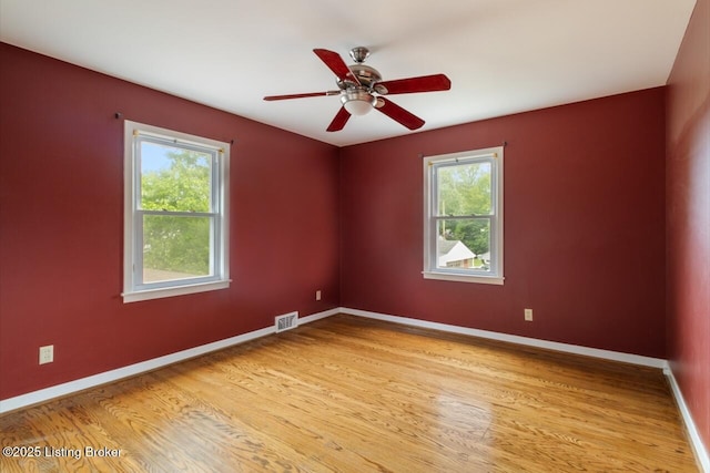 2603 Ballad Blvd, Jeffersontown, KY 40299 - empty room with light wood finished floors, baseboards, and a ceiling fan