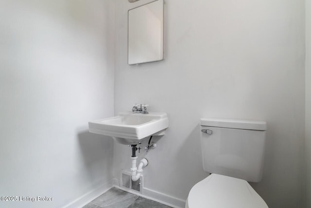 2603 Ballad Blvd, Jeffersontown, KY 40299 - half bath featuring toilet and baseboards