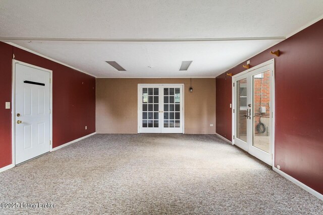 2603 Ballad Blvd, Jeffersontown, KY 40299 - empty room featuring french doors, carpet flooring, and baseboards