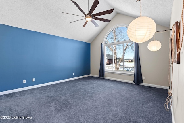 126 Deep Springs Dr, Bardstown, KY 40004 - spare room featuring ceiling fan, a textured ceiling, dark carpet, plenty of natural light, and lofted ceiling