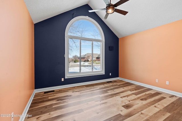 126 Deep Springs Dr, Bardstown, KY 40004 - spare room featuring ceiling fan, lofted ceiling, wood finished floors, and baseboards