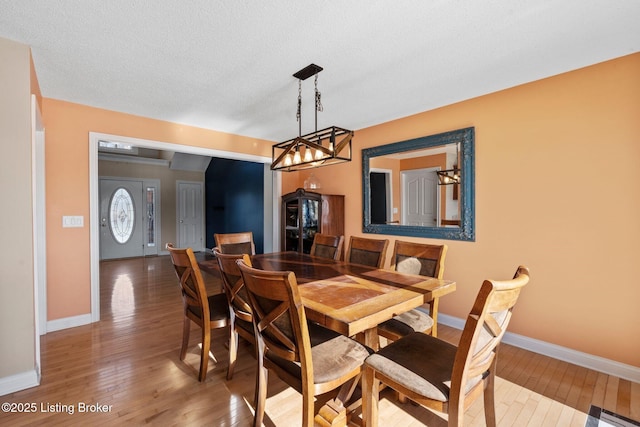 126 Deep Springs Dr, Bardstown, KY 40004 - dining space featuring wood-type flooring, baseboards, and a chandelier