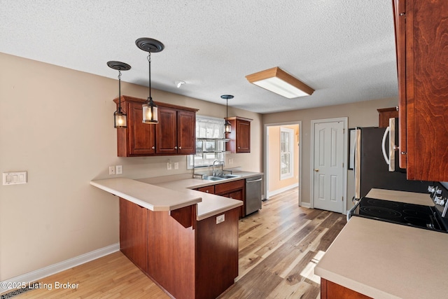 126 Deep Springs Dr, Bardstown, KY 40004 - kitchen with black electric range oven, a sink, stainless steel dishwasher, a peninsula, and light wood-type flooring