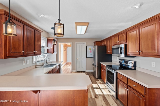126 Deep Springs Dr, Bardstown, KY 40004 - kitchen with stainless steel appliances, a sink, light wood-style floors, light countertops, and a textured ceiling