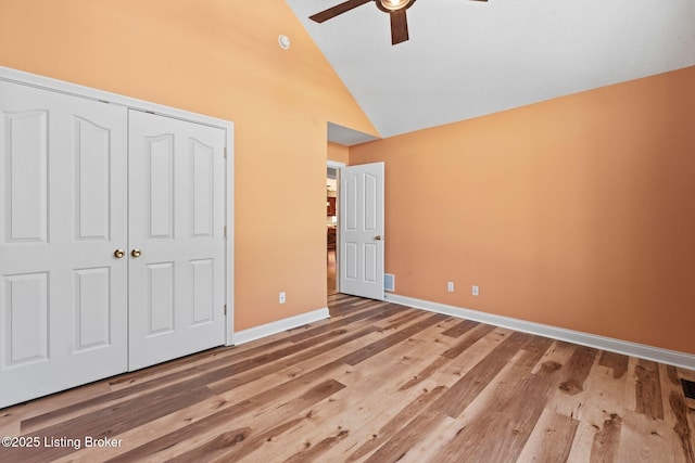 126 Deep Springs Dr, Bardstown, KY 40004 - unfurnished bedroom with a closet, wood finished floors, high vaulted ceiling, baseboards, and a ceiling fan