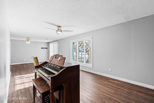 126 Deep Springs Dr, Bardstown, KY 40004 - living area featuring a ceiling fan, a textured ceiling, dark wood finished floors, and baseboards