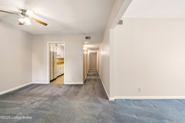 1815 Gardiner Ln Unit C29, Louisville, KY 40205 - spare room featuring carpet floors, ceiling fan, and baseboards
