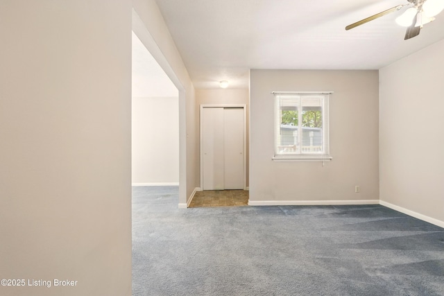 1815 Gardiner Ln Unit C29, Louisville, KY 40205 - spare room with carpet, ceiling fan, and baseboards