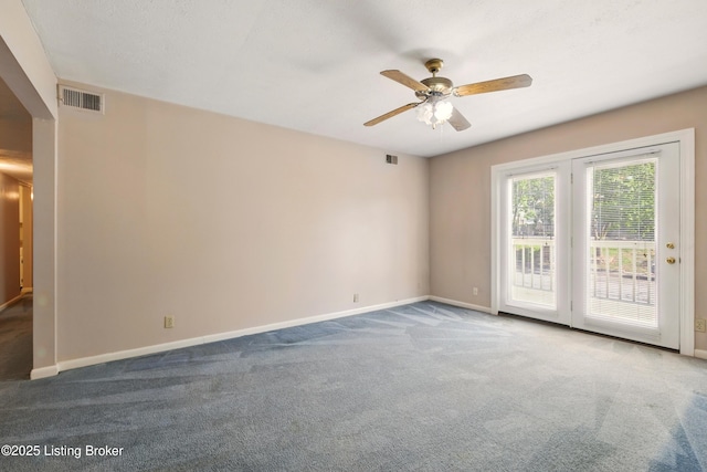 1815 Gardiner Ln Unit C29, Louisville, KY 40205 - empty room featuring carpet flooring, ceiling fan, and baseboards