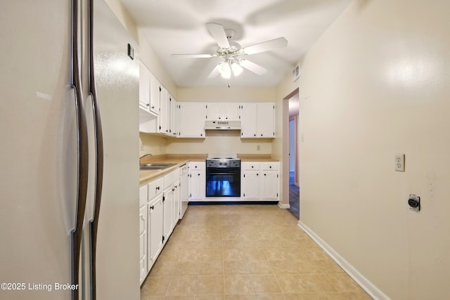 1815 Gardiner Ln Unit C29, Louisville, KY 40205 - kitchen featuring freestanding refrigerator, electric range oven, a sink, under cabinet range hood, and ceiling fan
