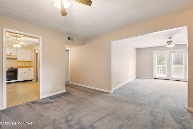 1815 Gardiner Ln Unit C29, Louisville, KY 40205 - unfurnished room featuring a ceiling fan, carpet flooring, and baseboards