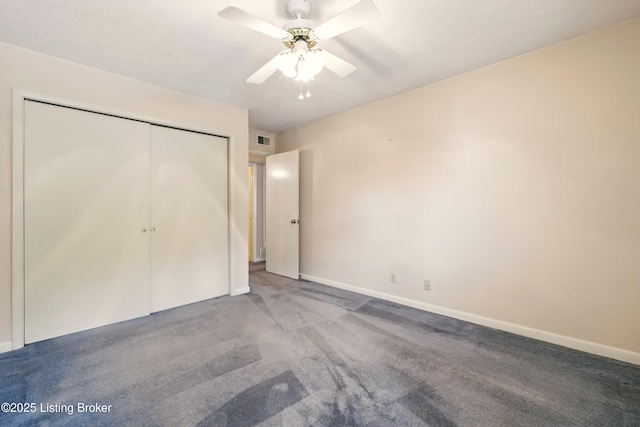 1815 Gardiner Ln Unit C29, Louisville, KY 40205 - unfurnished bedroom featuring a closet, carpet, baseboards, and ceiling fan