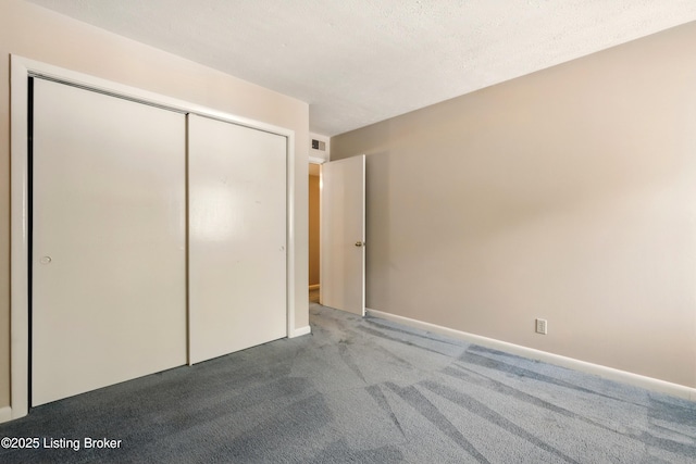 1815 Gardiner Ln Unit C29, Louisville, KY 40205 - unfurnished bedroom with carpet floors, a closet, and baseboards