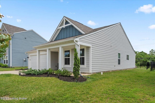 119 Wildflower Ave, Mt Washington, KY 40047 - view of front of house featuring board and batten siding, an attached garage, and a porch