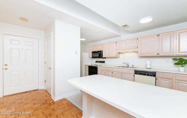 1508 Forest Park Rd, Louisville, KY 40223 - kitchen featuring white appliances, a sink, light countertops, light brown cabinetry, and baseboards