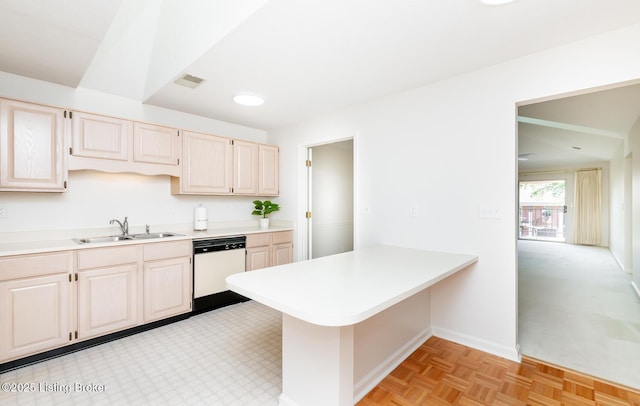 1508 Forest Park Rd, Louisville, KY 40223 - kitchen with dishwasher, a sink, light countertops, a peninsula, and baseboards