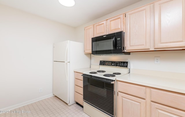 1508 Forest Park Rd, Louisville, KY 40223 - kitchen featuring range with electric cooktop, black microwave, light brown cabinetry, light countertops, and light flooring