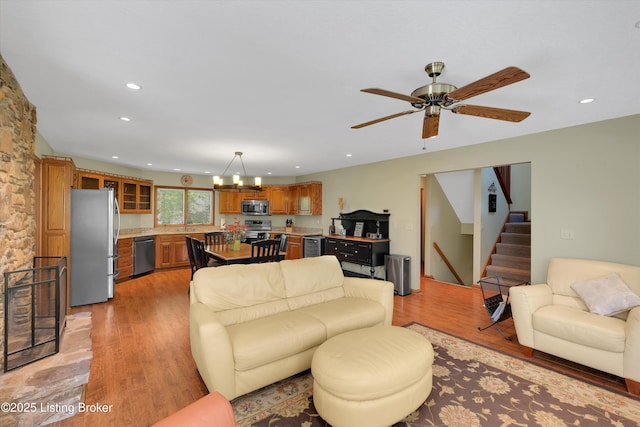 763 Lochober Rd, Leitchfield, KY 42754 - living area with light wood-style floors, recessed lighting, stairway, ceiling fan, and a chandelier