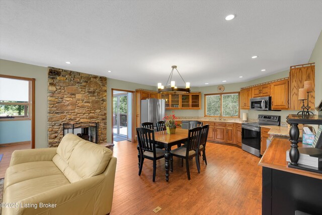 763 Lochober Rd, Leitchfield, KY 42754 - dining area featuring healthy amount of natural light, a chandelier, light wood-type flooring, and recessed lighting