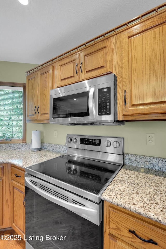 763 Lochober Rd, Leitchfield, KY 42754 - kitchen featuring stainless steel appliances and light stone counters