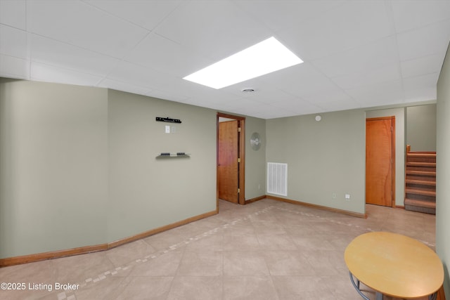 763 Lochober Rd, Leitchfield, KY 42754 - finished below grade area with a drop ceiling, stairway, and baseboards