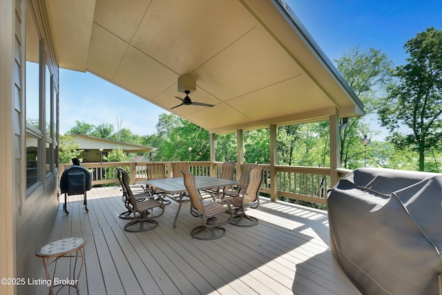 763 Lochober Rd, Leitchfield, KY 42754 - wooden deck featuring outdoor dining space, a ceiling fan, and a grill