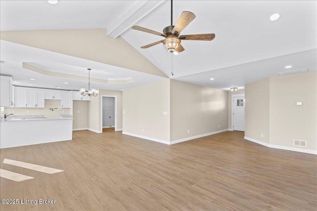 102 Kidd Ct, Lebanon Junction, KY 40150 - unfurnished living room featuring ceiling fan, a chandelier, recessed lighting, light wood finished floors, and baseboards