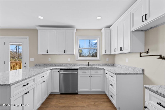 102 Kidd Ct, Lebanon Junction, KY 40150 - kitchen with dishwasher, a sink, a peninsula, white cabinets, and recessed lighting