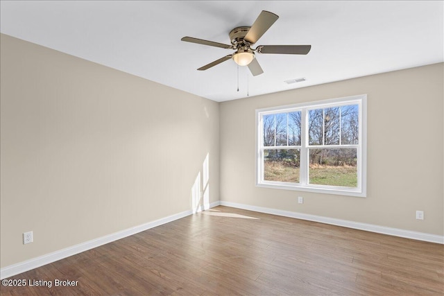 102 Kidd Ct, Lebanon Junction, KY 40150 - unfurnished room featuring wood finished floors, baseboards, and ceiling fan