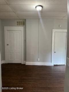 224 E Oak St, Louisville, KY 40203 - empty room featuring baseboards and dark wood-style flooring