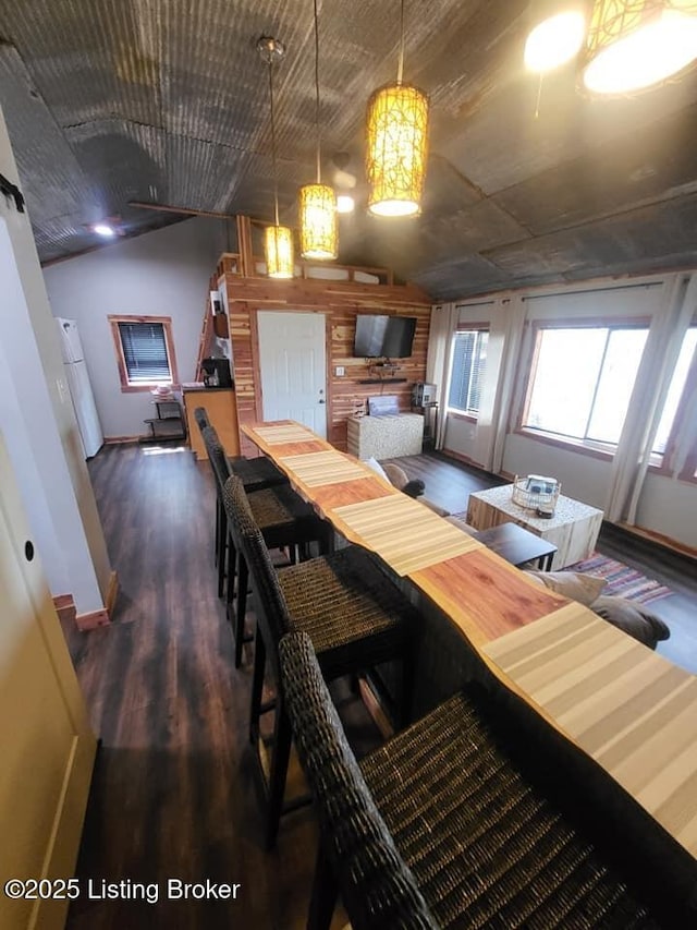 41 Hidden Valley Ln Unit B, Hudson, KY 40145 - dining space with vaulted ceiling, wood finished floors, and baseboards