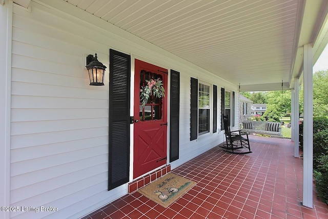 930 Castlewood Dr, New Albany, IN 47150 - doorway to property featuring a porch