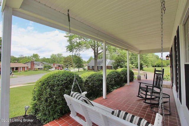 930 Castlewood Dr, New Albany, IN 47150 - covered porch with a residential view