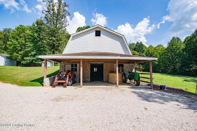 3297 E Gap Hill Rd, Cub Run, KY 42729 - view of front of home with a gambrel roof, a front lawn, and a carport