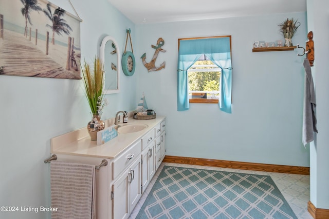 3297 E Gap Hill Rd, Cub Run, KY 42729 - bathroom featuring vanity, baseboards, and tile patterned floors