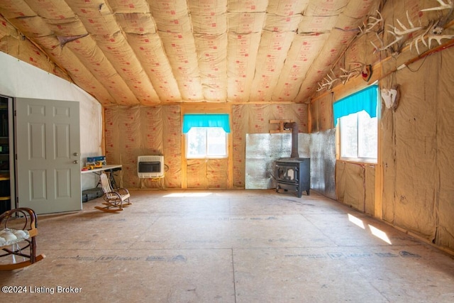 3297 E Gap Hill Rd, Cub Run, KY 42729 - additional living space featuring heating unit, a wood stove, and healthy amount of natural light