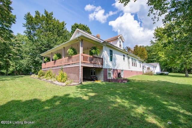 3297 E Gap Hill Rd, Cub Run, KY 42729 - view of home's exterior featuring a lawn, a chimney, and a deck