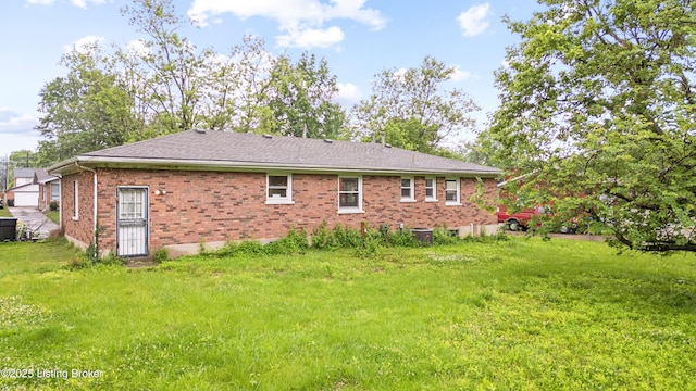 6615 Morocco Dr, Louisville, KY 40214 - rear view of property featuring brick siding and a lawn