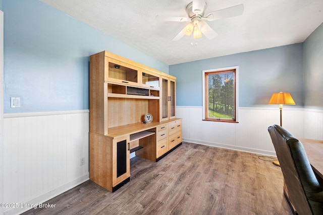 9605 Cooks Mill Rd, Georgetown, IN 47122 - office space featuring a wainscoted wall, wood finished floors, and ceiling fan