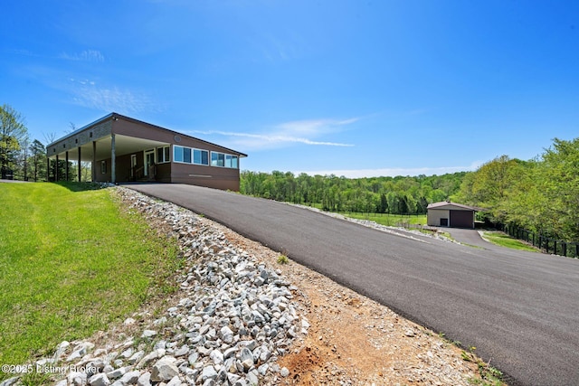 9605 Cooks Mill Rd, Georgetown, IN 47122 - view of asphalt driveway with a view of trees